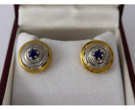 A Pair of Lady's 18 ct Yellow, White Gold and Sapphire Disc Coil Earrings, approx wt 4.5 gms.