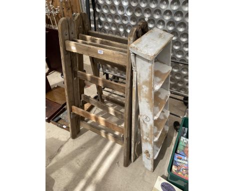 A VINTAGE WOODEN FOUR RUNG STEP LADDER AND TWO FOLDING WOODEN STANDS 