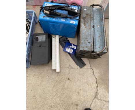 A CLARKE ARC WLEDER, WELDING MASK, AND A METAL TOOL BOX WITH AN ASSORTMENT OF HAND TOOLS ETC 