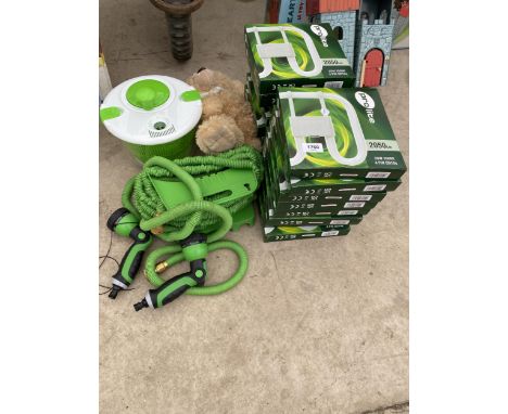 AN ASSORTMENT OF ITEMS TO INCLUDE LIGHT BULBS, A HOSE PIPE AND A SALAD SPINNER ETC 