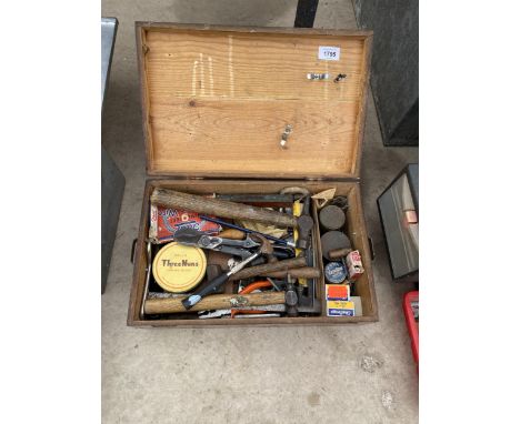 A WOODEN CHEST CONTAINING AN ASSORTMENT OF TOOLS AND HARDWARE TO INCLUDE HAMMERS AND TIN SNIPS ETC 