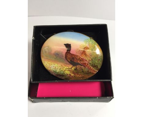 A HANDPAINTED CERAMIC PHEASANT BROOCH 