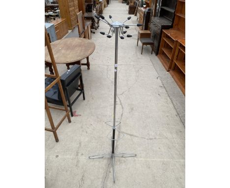 A 1970'S BLACK PAINTED AND POLISHED CHROME COAT/HAT AND STICK STAND WITH TWELVE HOOKS 