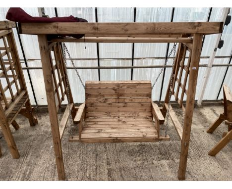 AN AS NEW EX DISPLAY CHARLES TAYLOR TWO SEATER SWING SEAT BENCH WITH CANOPY TOP *PLEASE NOTE VAT TO BE CHARGED ON THIS ITEM* 