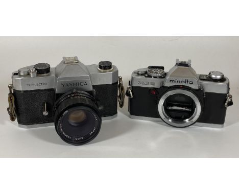 TWO VINTAGE CAMERAS - YASHICA TL-ELECTRO FITTED WITH A YASHICA AUTO 50MM LENS AND A MINOLTA XG2 BODY 