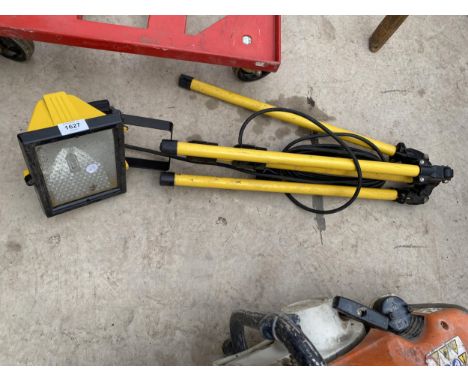 A WORK LIGHT WITH TRIPOD STAND 