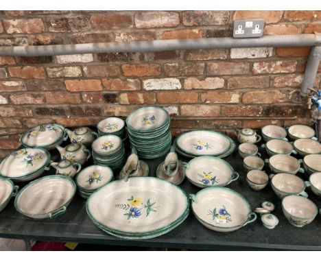 A LARGE VINTAGE STONEWARE FLORAL PATTERN DINNER SERVICE 