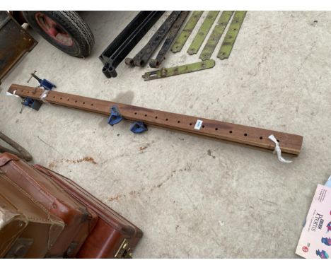 A PAIR OF WOODEN RECORD SASH CLAMPS 