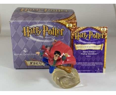 A BOXED ROYAL DOULTON HARRY POTTER PLAYING QUIDDITCH HPFIG22 FIGURE WITH CERTIFICATE 