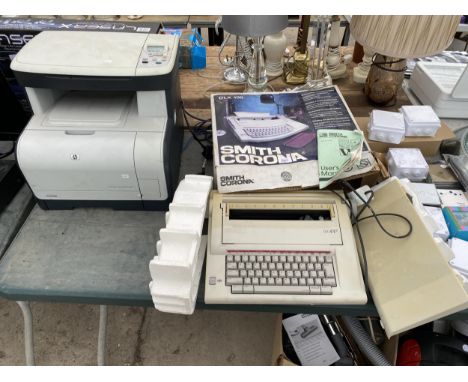 A SMITH CORONA TYPEWRITER AND A HP PRINTER 