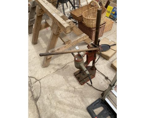 A VINTAGE WOLF DRILL STAND AND DRILL 
