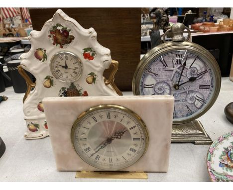 A BATTERY OPERATED CLOCK IN THE FORM OF A POCKET WATCH, WESTCLOX MANTLE CLOCK FAUX MARBLE AND A  CERAMIC CLOCK WITH FRUIT DES