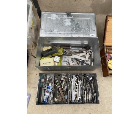 A METAL TOOL CHEST WITH AN ASSORTMENT OF TOOLS TO INCLUDE SPANNERS AND FILES ETC 