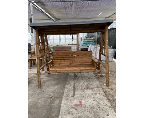 AN AS NEW EX DISPLAY CHARLES TAYLOR THREE SEATER SWING SEAT BENCH WITH CANOPY TOP *PLEASE NOTE VAT TO BE CHARGED ON THIS ITEM