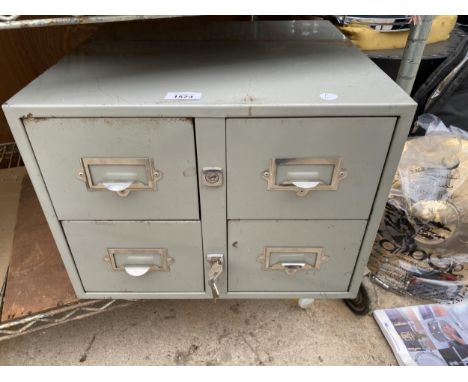 A VINTAGE FOUR DRAWER METAL INDEX CABINET 