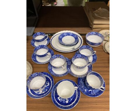 A GROUP OF VINTAGE BLUE AND WHITE ROYAL ALBION 'RICHMOND' PATTERN TEA CUPS AND SAUCERS 