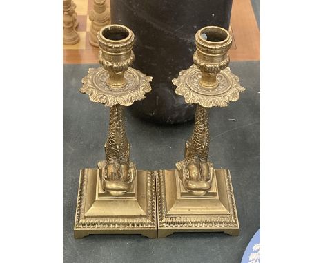 A PAIR OF VINTAGE BRASS DOLPHIN CANDLESTICKS HEIGHT 22CM 