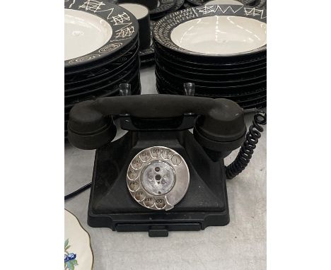 A VINTAGE BAKELITE TELEPHONE WITH DRAWER 