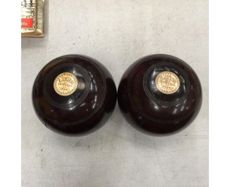 A PAIR OF VINTAGE BOWLS DATED 1894 AND 1904 