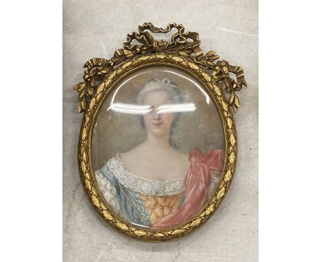 A 19TH CENTURY HAND PAINTED PORTRAIT OF A LADY, INDISTINCTLY SIGNED, IN GILT RIBBON FRAME, LENGTH 10CM 