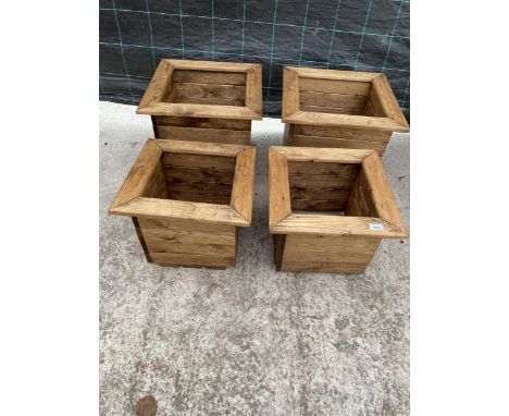 AN AS NEW EX DISPLAY CHARLES TAYLOR SET OF FOUR GRADUATED PLANTERS *PLEASE NOTE VAT TO BE CHARGED ON THIS ITEM* 