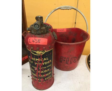 A VINTAGE RE CAST FIRE EXTINGUISHER PLUS A RED PLASTIC FIRE BUCKET 
