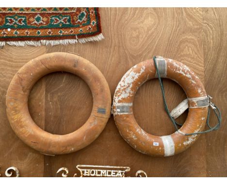TWO VINTAGE MATERIAL LIFE BOUYS 