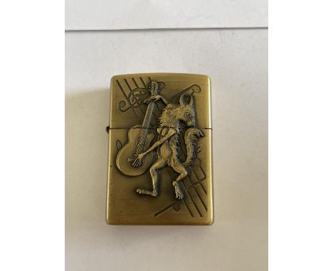 A DECORATIVE ZIPPO STLE LIGHTER 