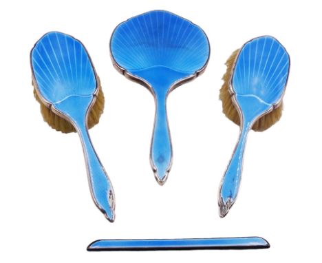 1930s silver and blue guilloche enamel four piece dressing table set, comprising two hairbrushes, hand mirror and comb holder