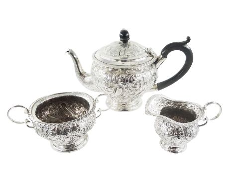 Late Victorian silver three piece bachelors tea service, comprising teapot, open sucrier and milk jug, each of bellied form, 