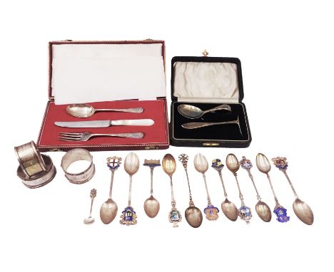 Group of silver, comprising three napkin rings, souvenir spoons, cased christening spoon and pusher set and a cased christeni