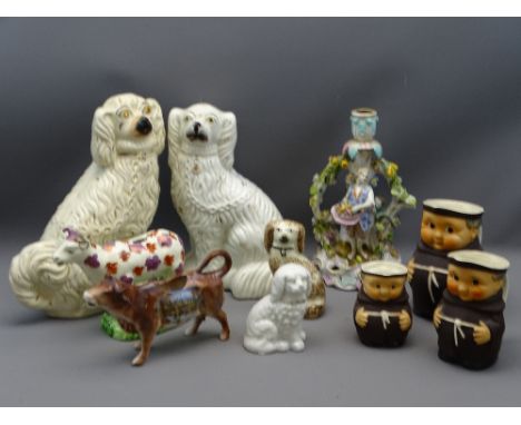 MIXED GROUP OF POTTERY &amp; PORCELAIN ORNAMENTS including a set of three Goebel Friar jugs, a floral encrusted figural candl