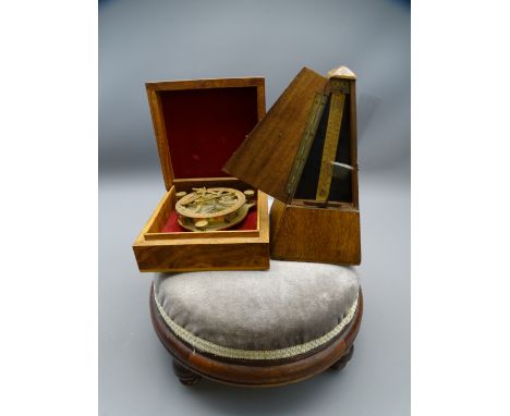 VINTAGE METRONOME, circular foot stool and a reproduction brass compass in a walnut lidded box