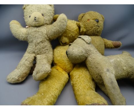 THREE VINTAGE TEDDY BEARS and a dog, including a musical circa 1950s bear, possibly Chiltern by Wendy Boston, various measure