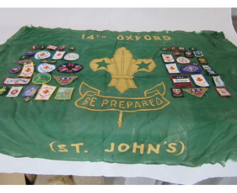 A vintage scout flag named to the 14th Oxford along with various sew on scout badges