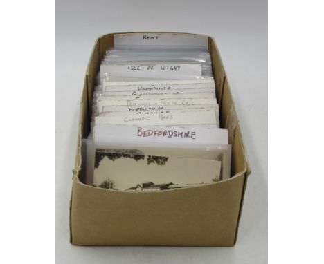 A collection of vintage English postcards in individual sleeves covering the counties Bedfordshire, Berkshire, Cambridgeshire