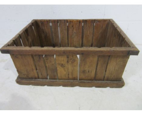 A vintage wooden metal bound crate, 69cm x 51cm x 21cm