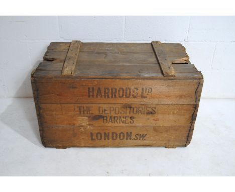 A vintage wooden 'Harrods Ltd' crate - length 89cm, depth 47cm, height 50cm