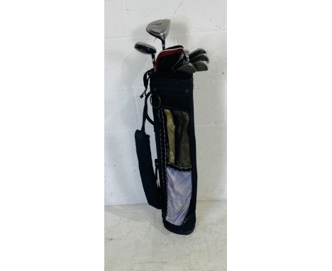 A junior set of right-handed Dunlop Max golf clubs including driver, irons 3 to 9, pitching wedge and sand wedge, along with 