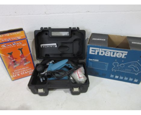 An unused Erbauer 3mm planer in carry case model number ERB905D along with a pair of Toolrack 2 ton capacity jack stands