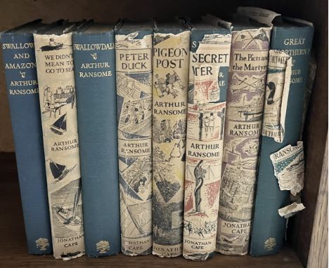 A collection of eight Arthur Ransome novels published by Jonathan Cape from the Swallows and Amazons series including first e