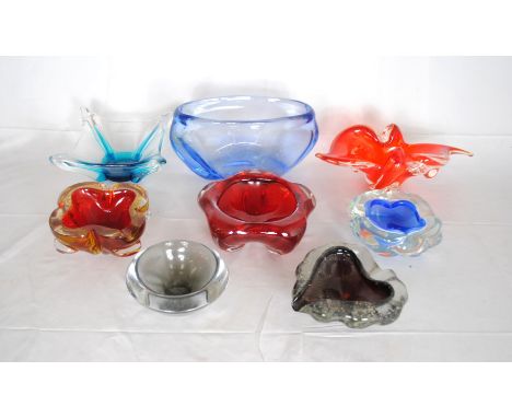 A collection of art glass bowls and dishes, including Murano, Whitefriars etc.