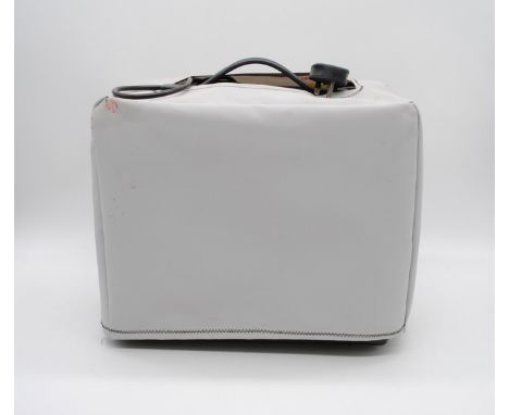 A Danville TEC-20B 20w bass amplifier, with protective cover