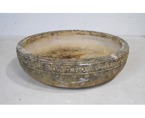 A large circular reconstituted stone garden planter - diameter 82cm, height 22cm