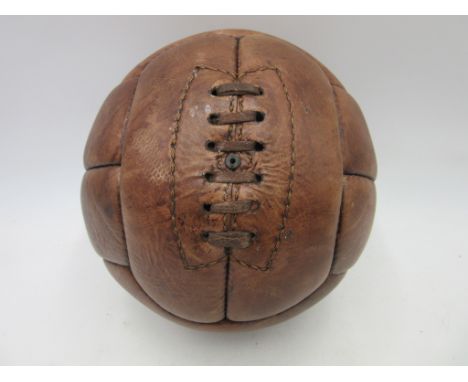 A vintage brown leather football