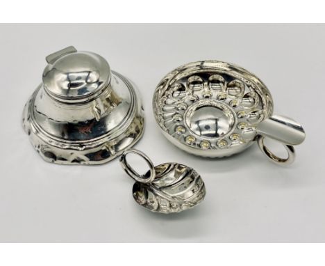 A hallmarked silver inkwell (A/F) along with a small silver leaf shaped wine taster and a silver plated wine taster