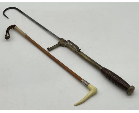 A Victorian brass and wood fish gaff hook plus a SCM mounted hunting crop.