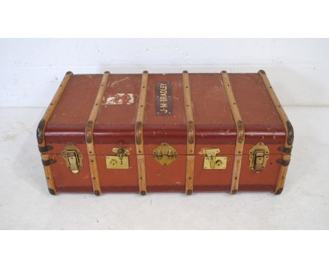 A vintage 'Garstin' steamer trunk, named to 'J. M. Bradley'