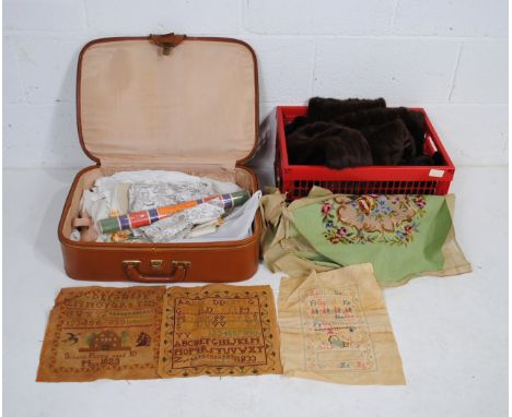 A quantity of various vintage textiles and clothing, including three needlework samplers, a quantity of mink fur stoles, babi
