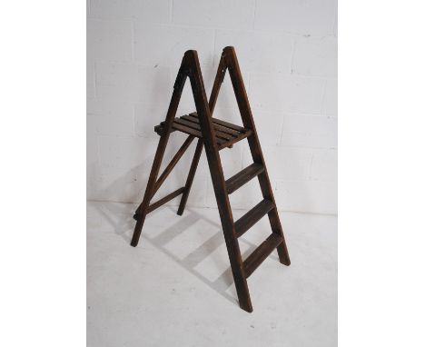 A vintage wooden folding step ladder - height 110cm